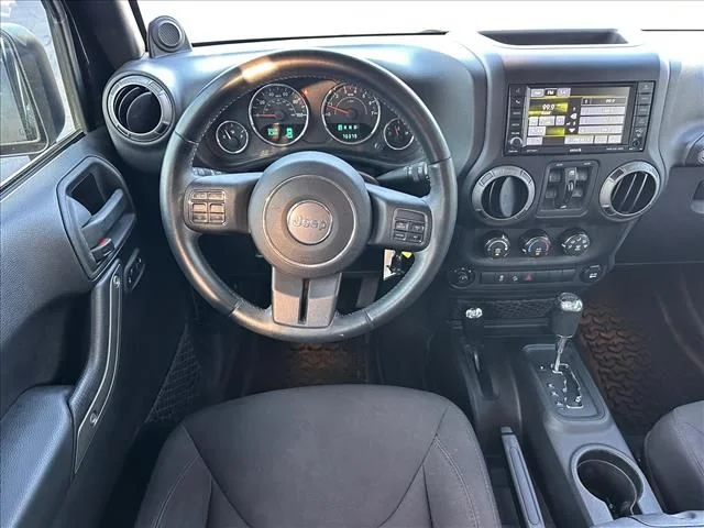 Used 2014 Black Jeep Unlimited Sport image 17