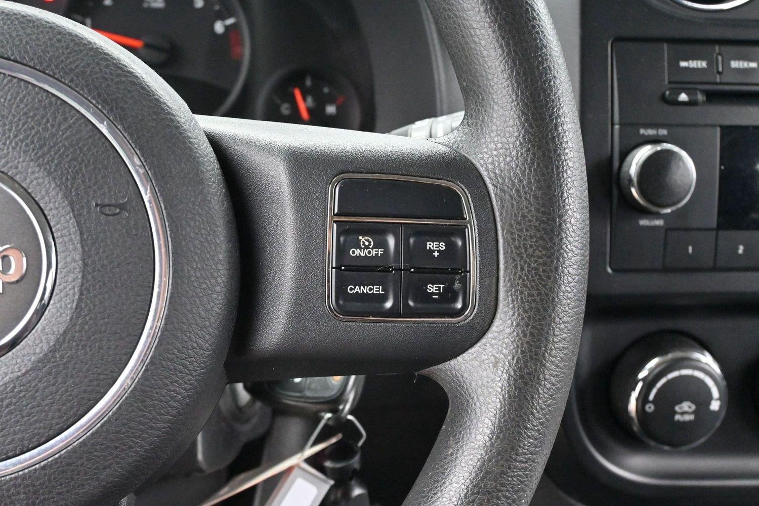 Used 2011 Brilliant Black Crystal Pearl Jeep Sport image 15