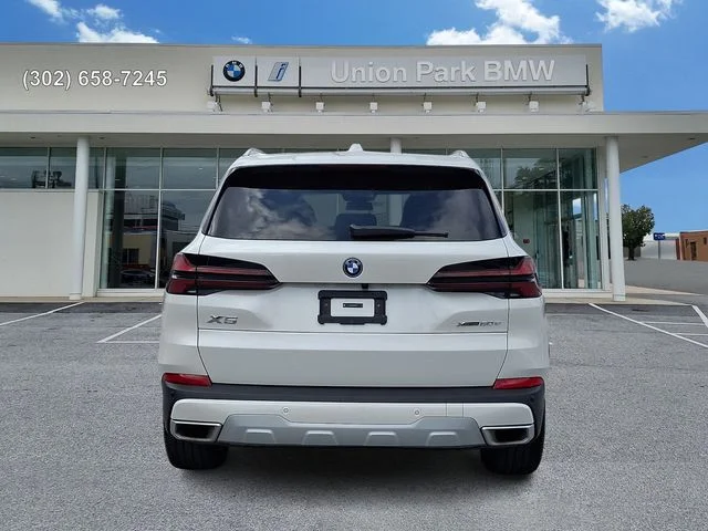 Certified Used 2025 Mineral White Metallic BMW xDrive50e image 5