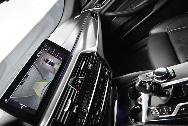 Used 2021 Black BMW M550i xDrive image 16