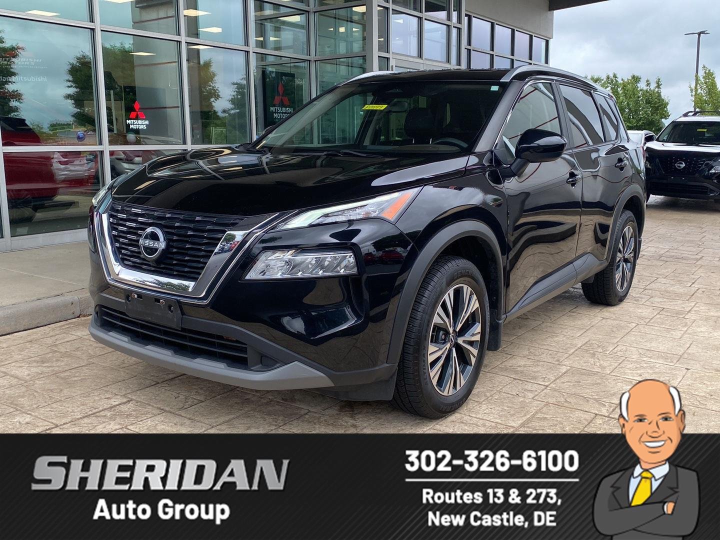 Certified Used 2023 Super Black Nissan SV image 1