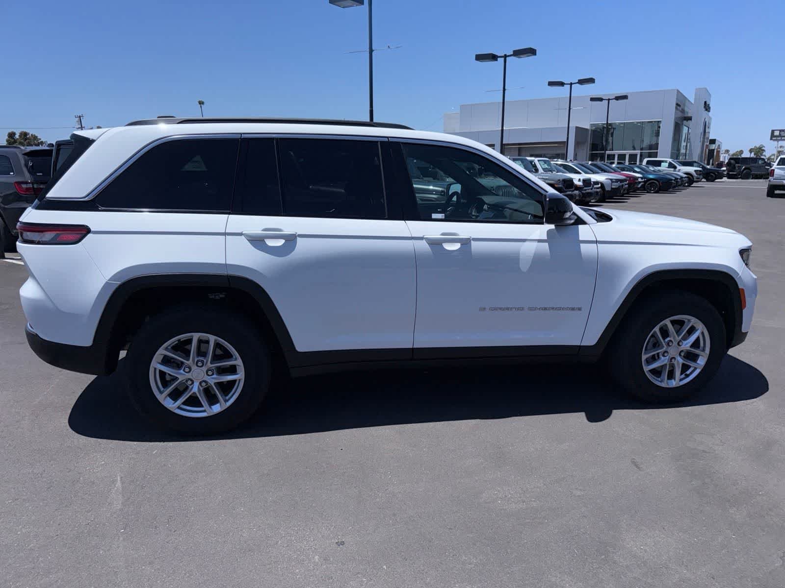 Used 2025 Bright White Clearcoat Jeep Laredo X image 12