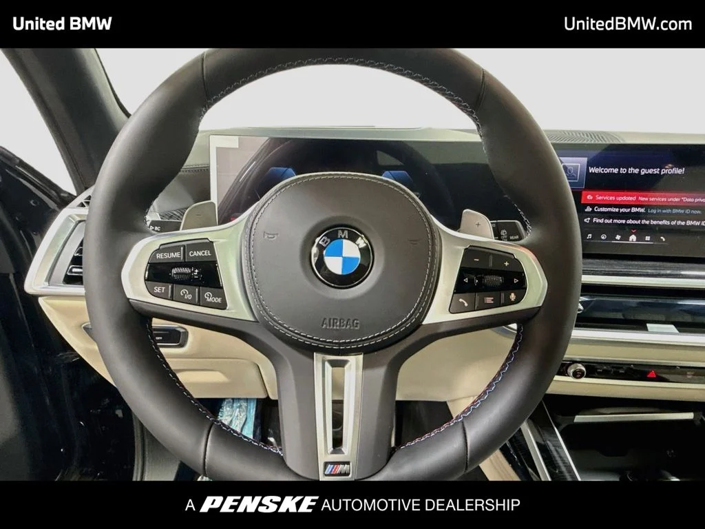 New 2027 Black Sapphire Metallic BMW M60i image 6
