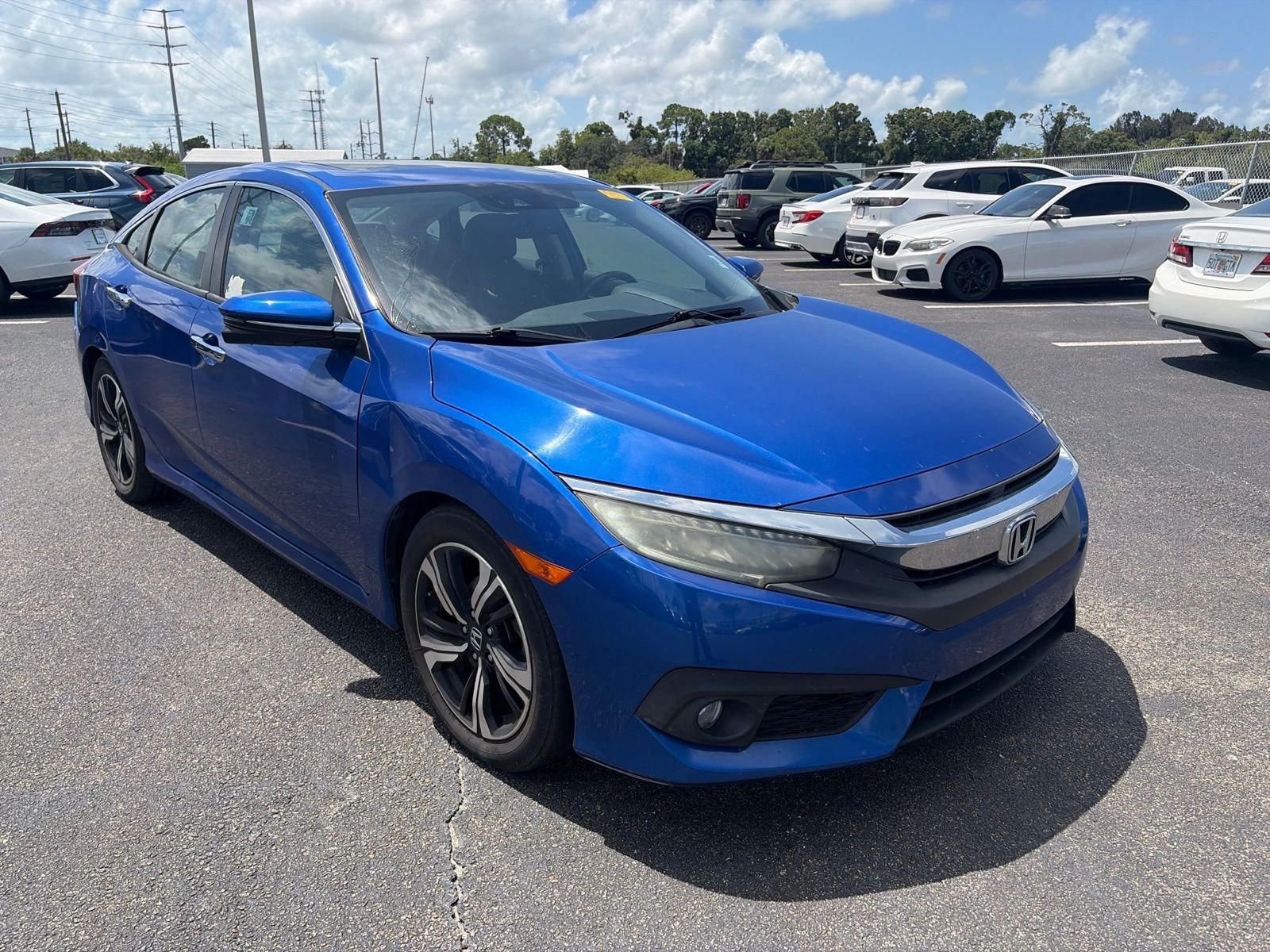 Used 2016 Blue Honda Touring image 1