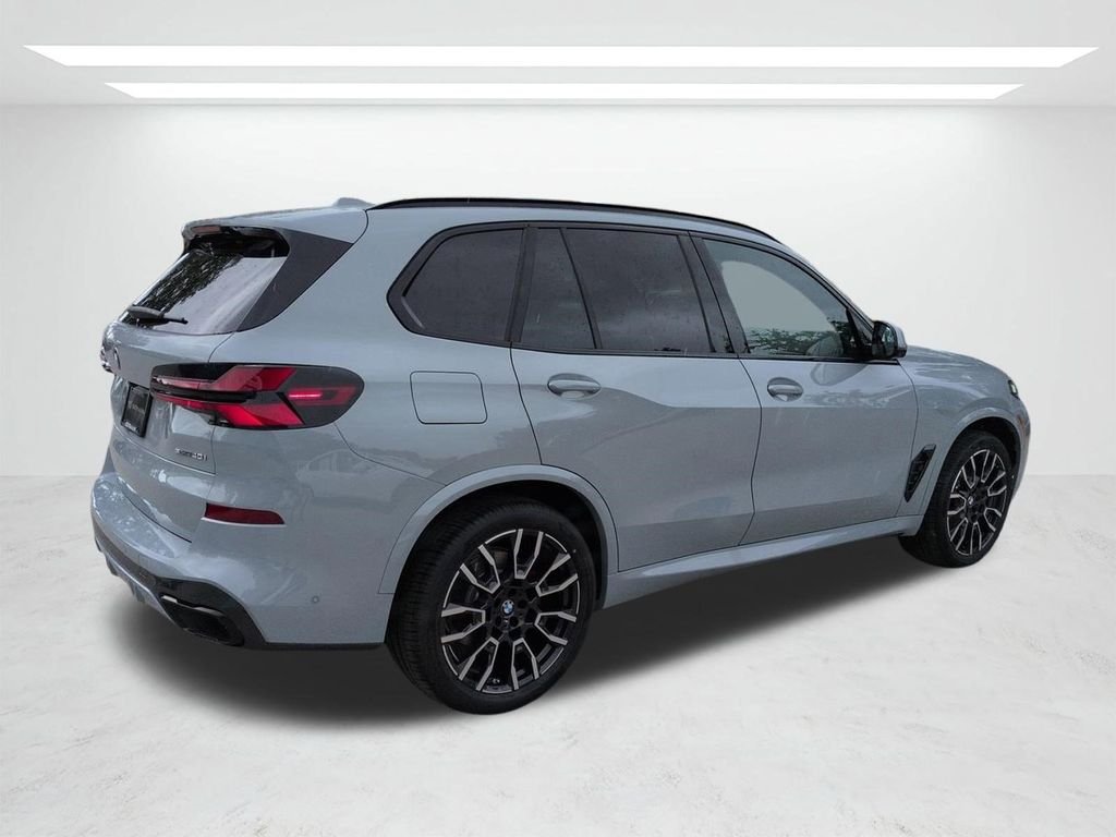 New 2026 Gray Metallic BMW sDrive40i image 4