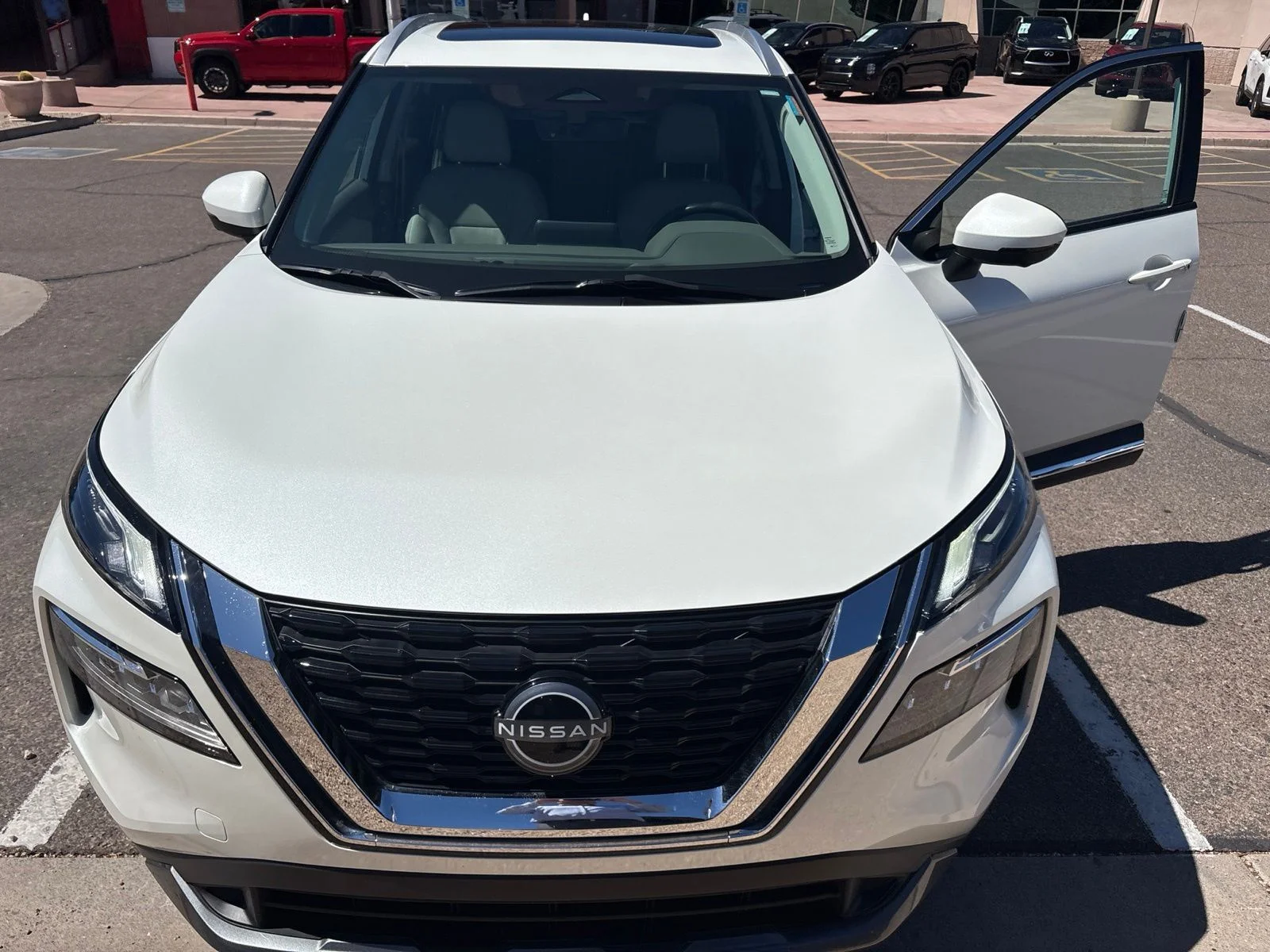 Used 2023 Pearl White Tricoat Nissan SL image 1