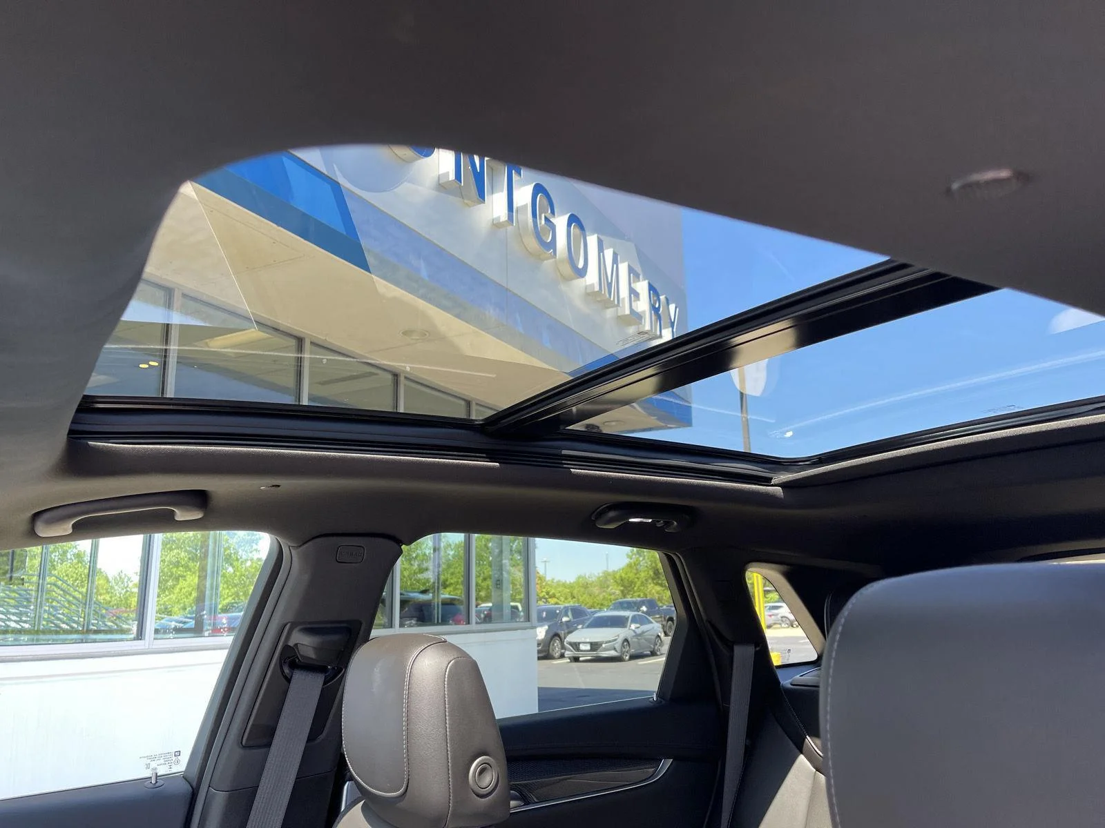 Used 2024 Emerald Lake Metallic Cadillac Sport image 28
