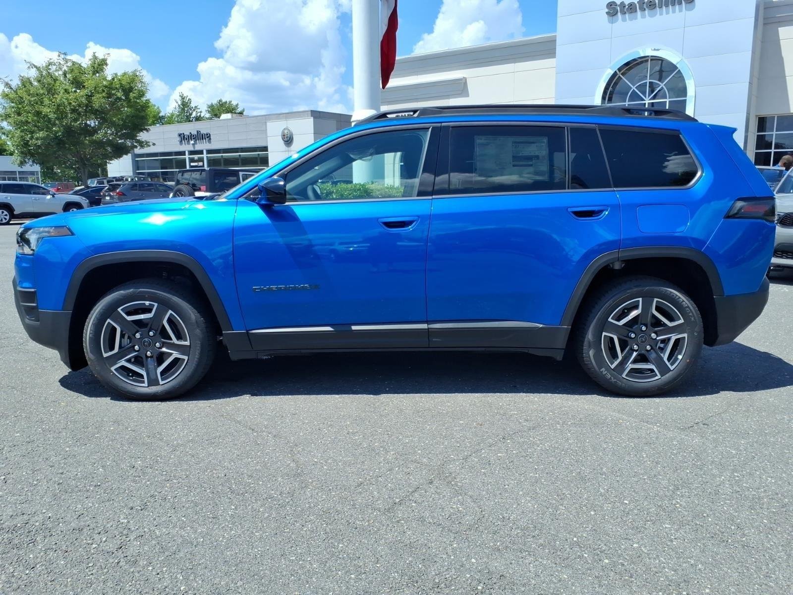 New 2026 Hydro Blue Pearl-Coat Exterior Paint Jeep Laredo image 3
