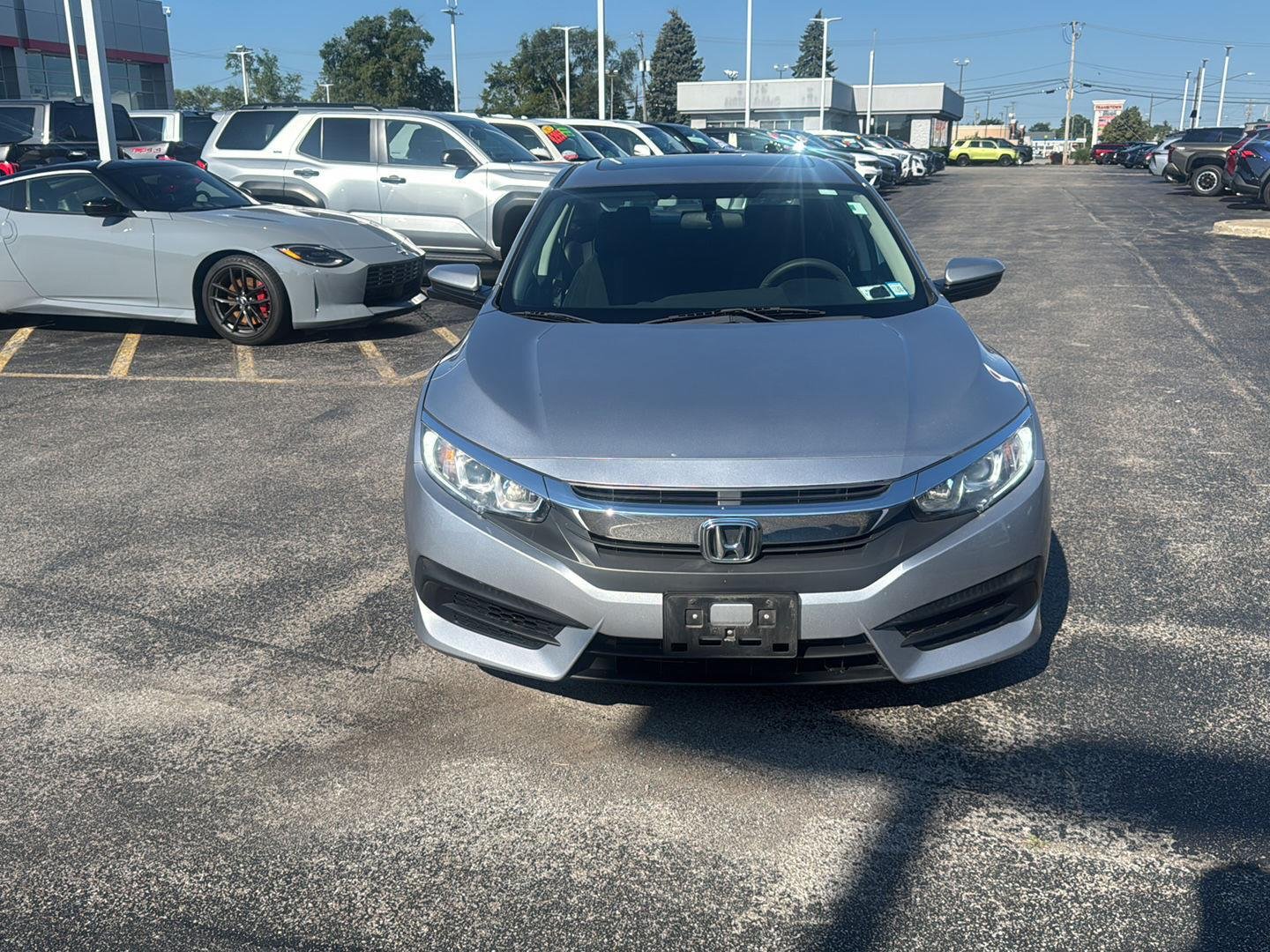 Used 2016 Honda Civic EX with VIN 19XFC2F70GE245805 for sale in Williamsville, NY