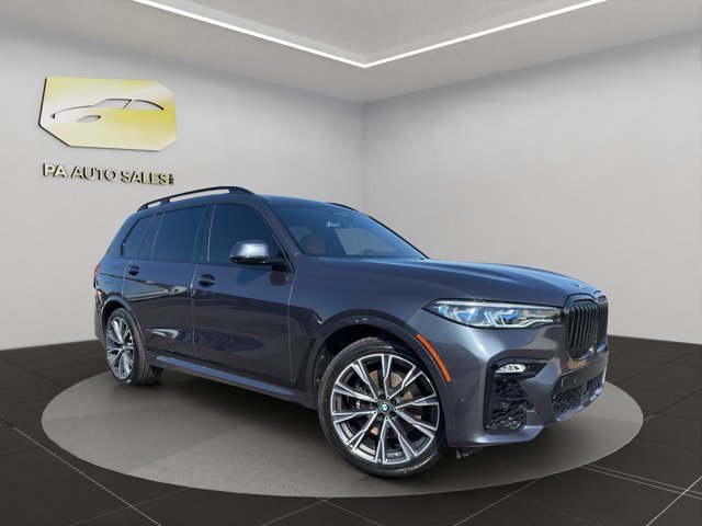 Used 2022 Arctic Grey Metallic BMW M50i image 1