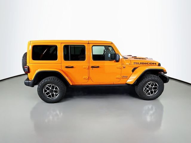 Used 2025 Orange Jeep Rubicon image 8