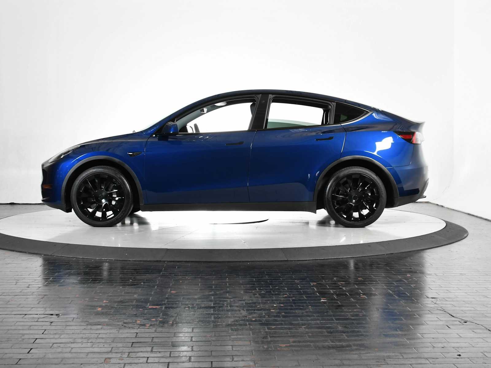 Used 2023 Tesla Model Y Long Range with VIN 7SAYGDEEXPA117879 for sale in Dallas, TX
