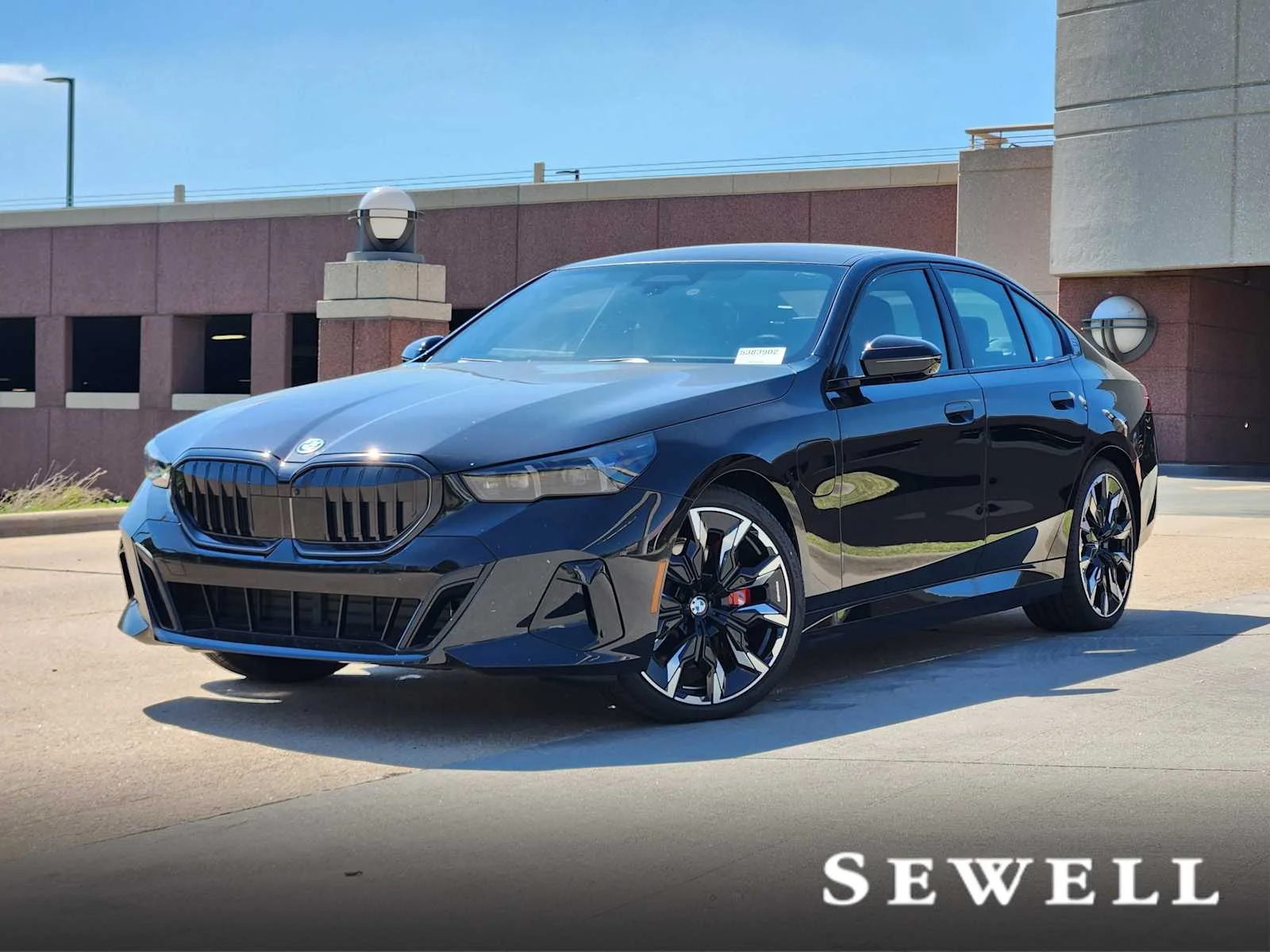 2026 BMW 5 Series 550e xDrive Sedan's photo