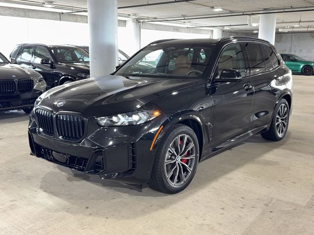 New 2026 Black Sapphire Metallic BMW xDrive50e image 3