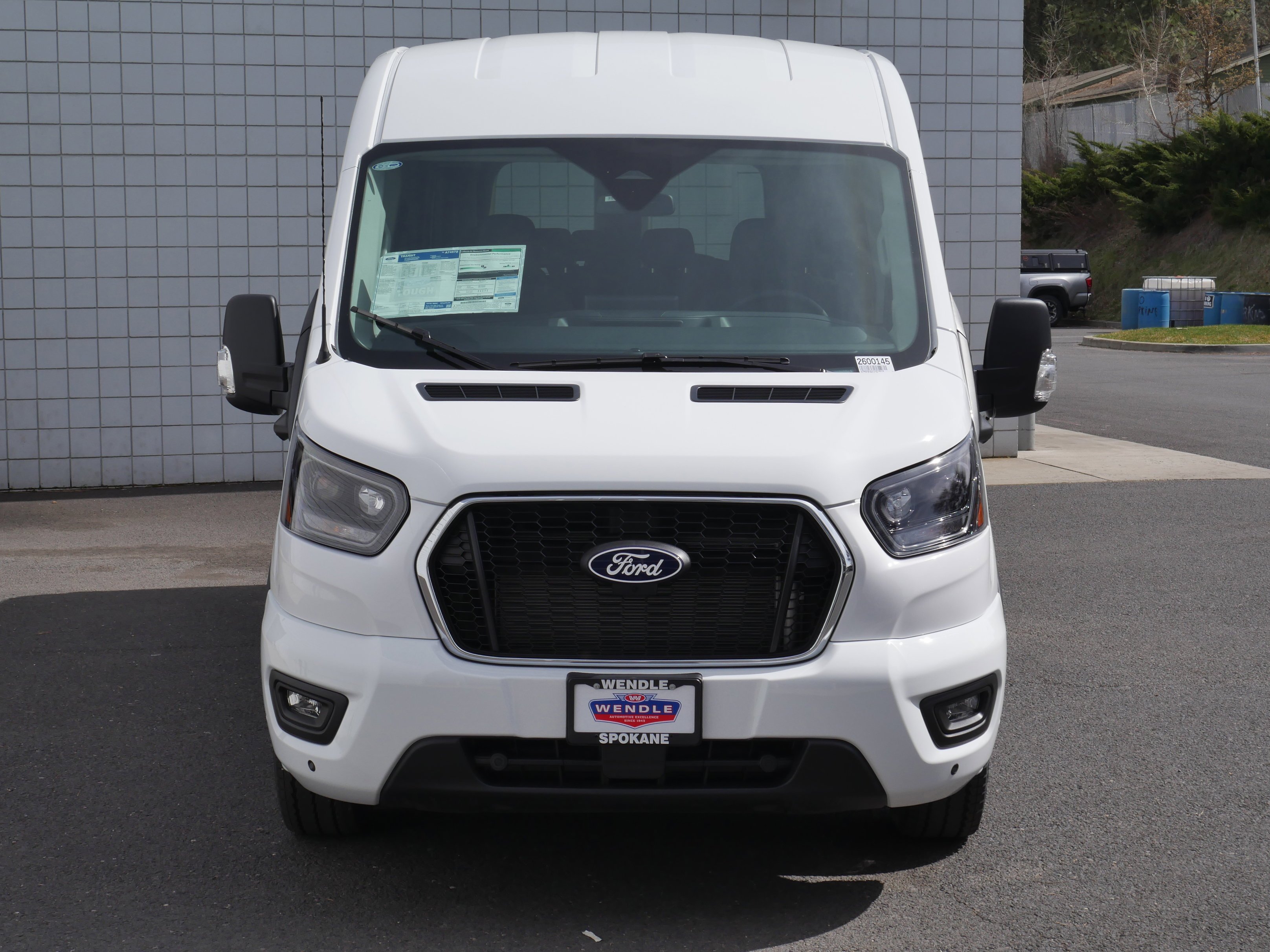 New 2026 Oxford White Ford Passenger Van XLT image 30