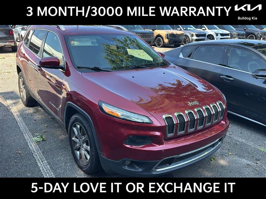 Used 2014 Deep Cherry Red Crystal Pearlcoat Jeep Limited image 1