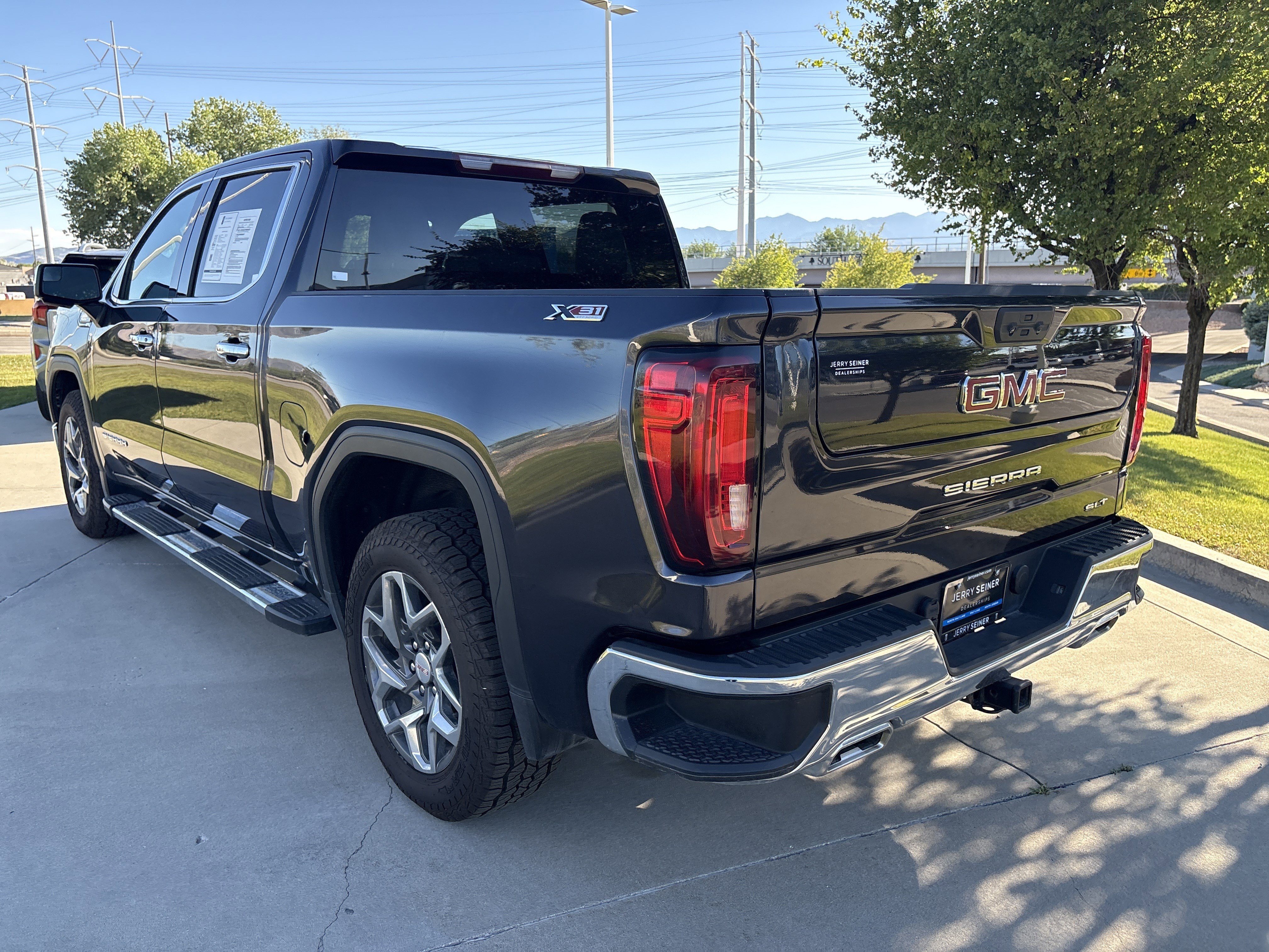 Used 2022 Titanium Rush Metallic GMC SLT image 3