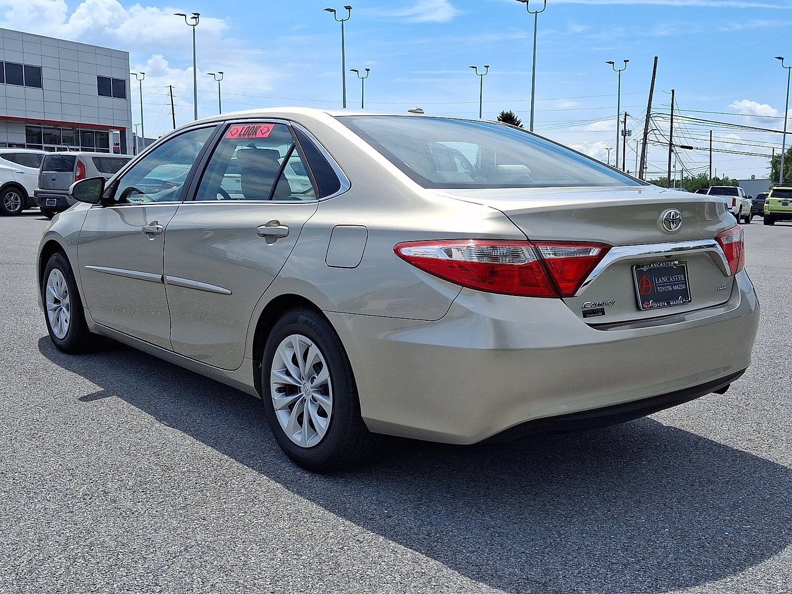 Used 2015 Creme Brulee Mica Toyota LE image 5