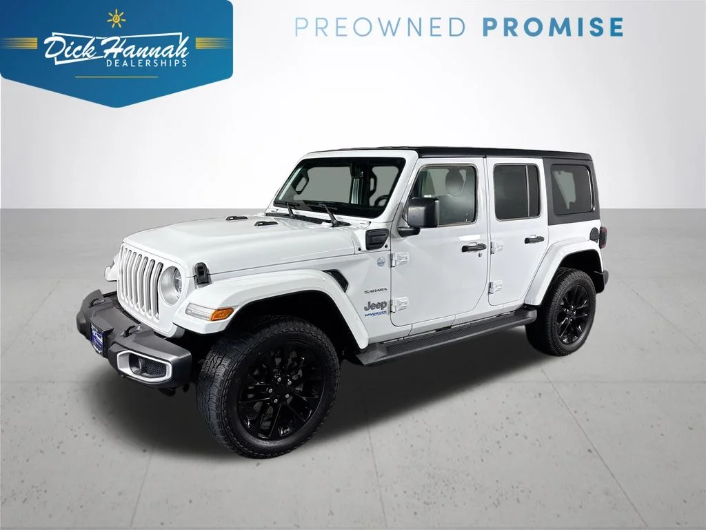 Used 2021 White Jeep Unlimited Sahara 4xe image 1