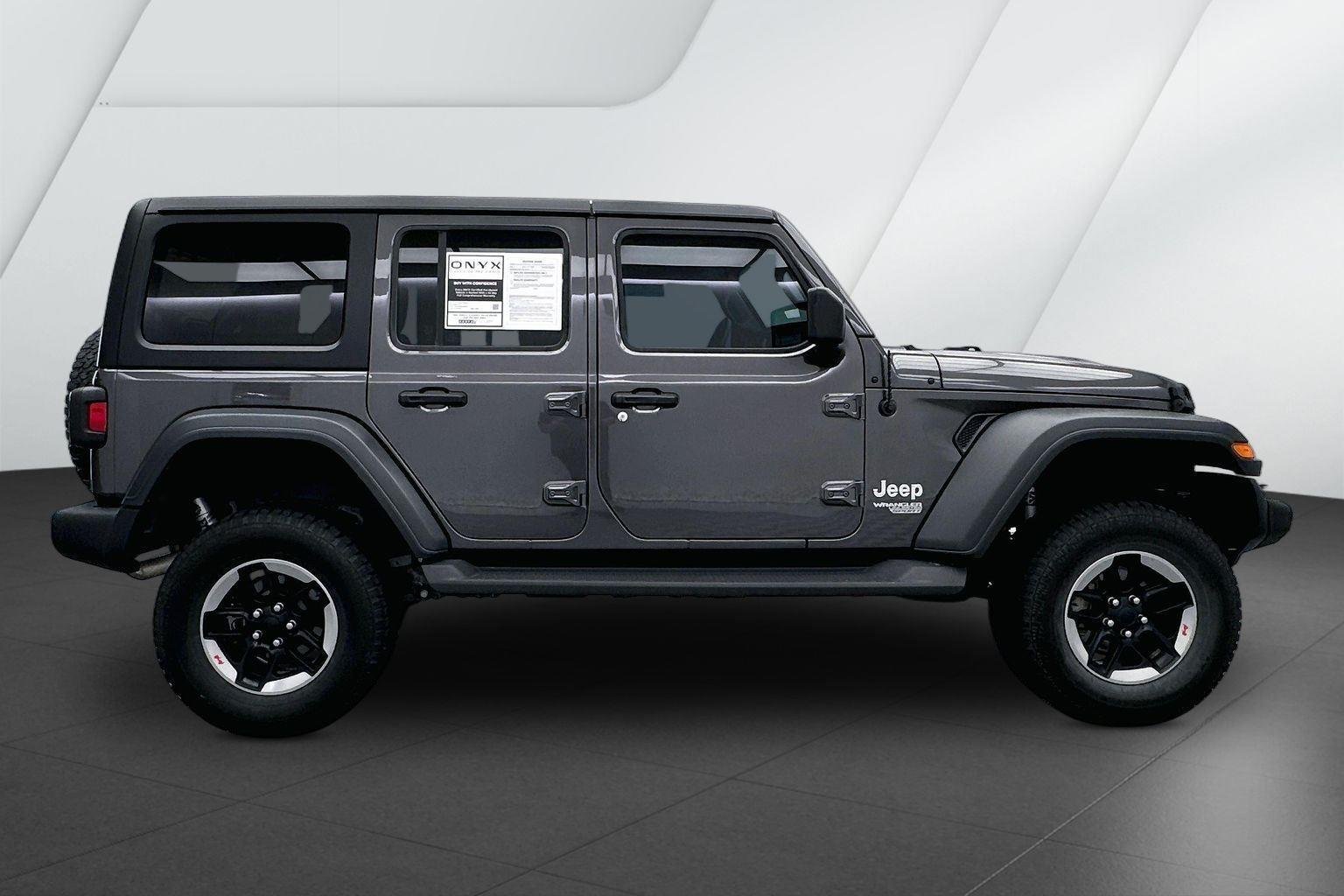 Used 2018 Granite Crystal Metallic Clearcoat Jeep Sport image 5