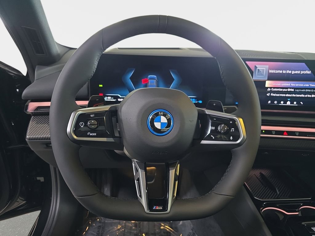 New 2027 Black Sapphire Metallic BMW 550e xDrive image 13