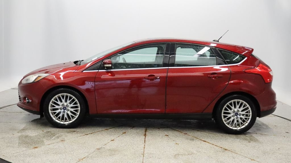 Used 2013 Ford Focus Titanium with VIN 1FADP3N27DL379646 for sale in Coon Rapids, Minnesota