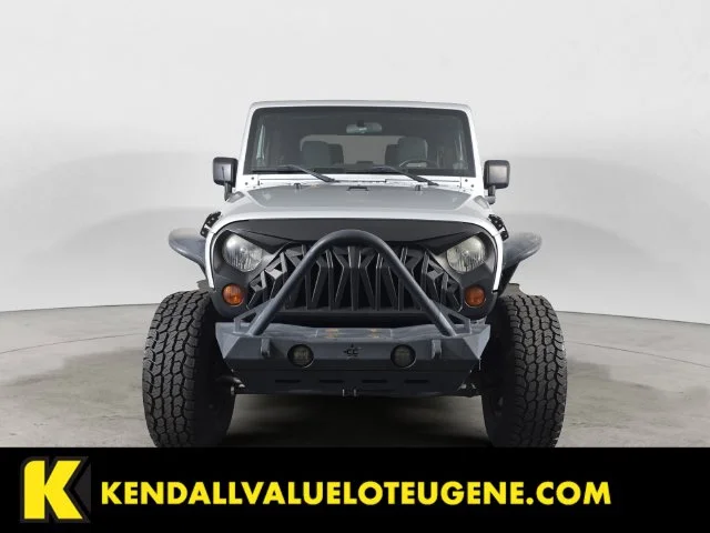 Used 2012 Silver Jeep Sport image 2