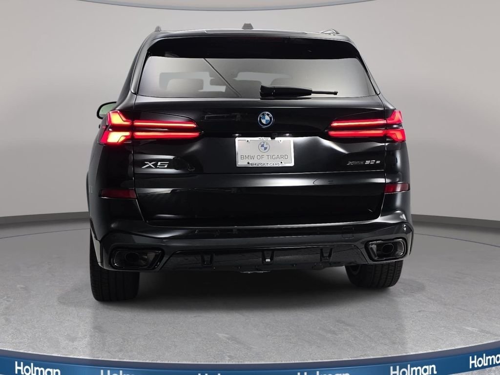 New 2026 Black Sapphire Metallic BMW xDrive50e image 6