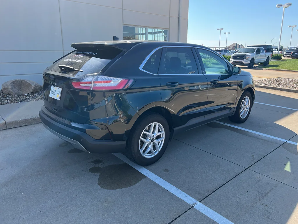 Used 2024 Agate Black Metallic Ford SEL image 10
