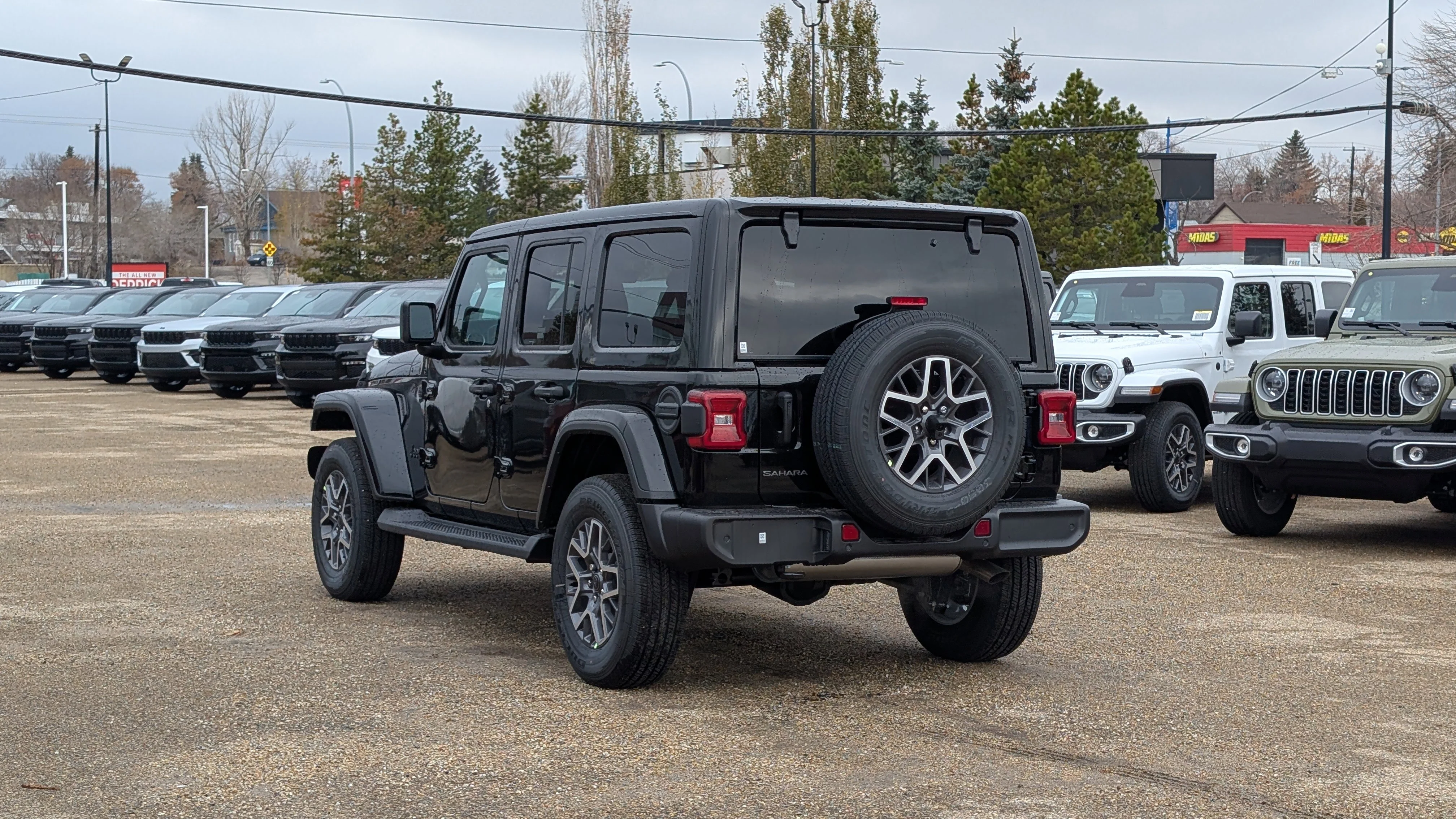 New 2026 Black Jeep Sahara image 4