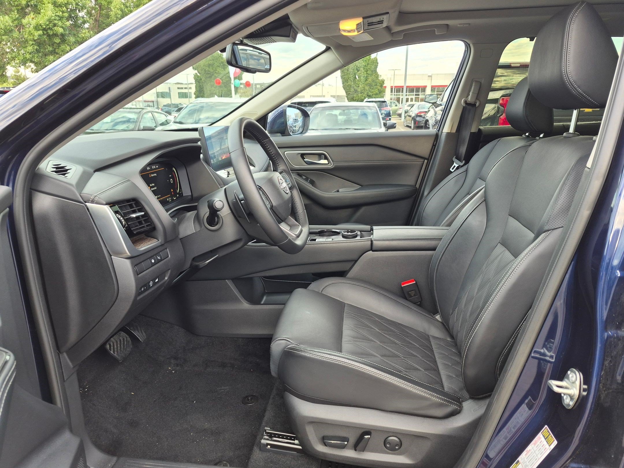 Used 2026 Deep Ocean Blue Pearl Nissan Platinum image 16