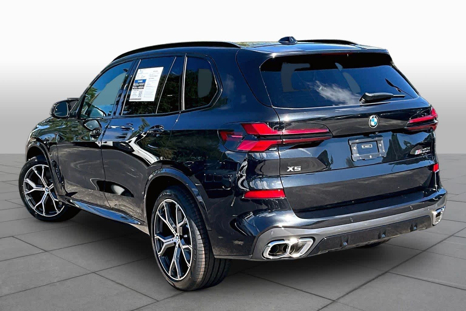Used 2026 Black Sapphire Metallic BMW M60i image 12