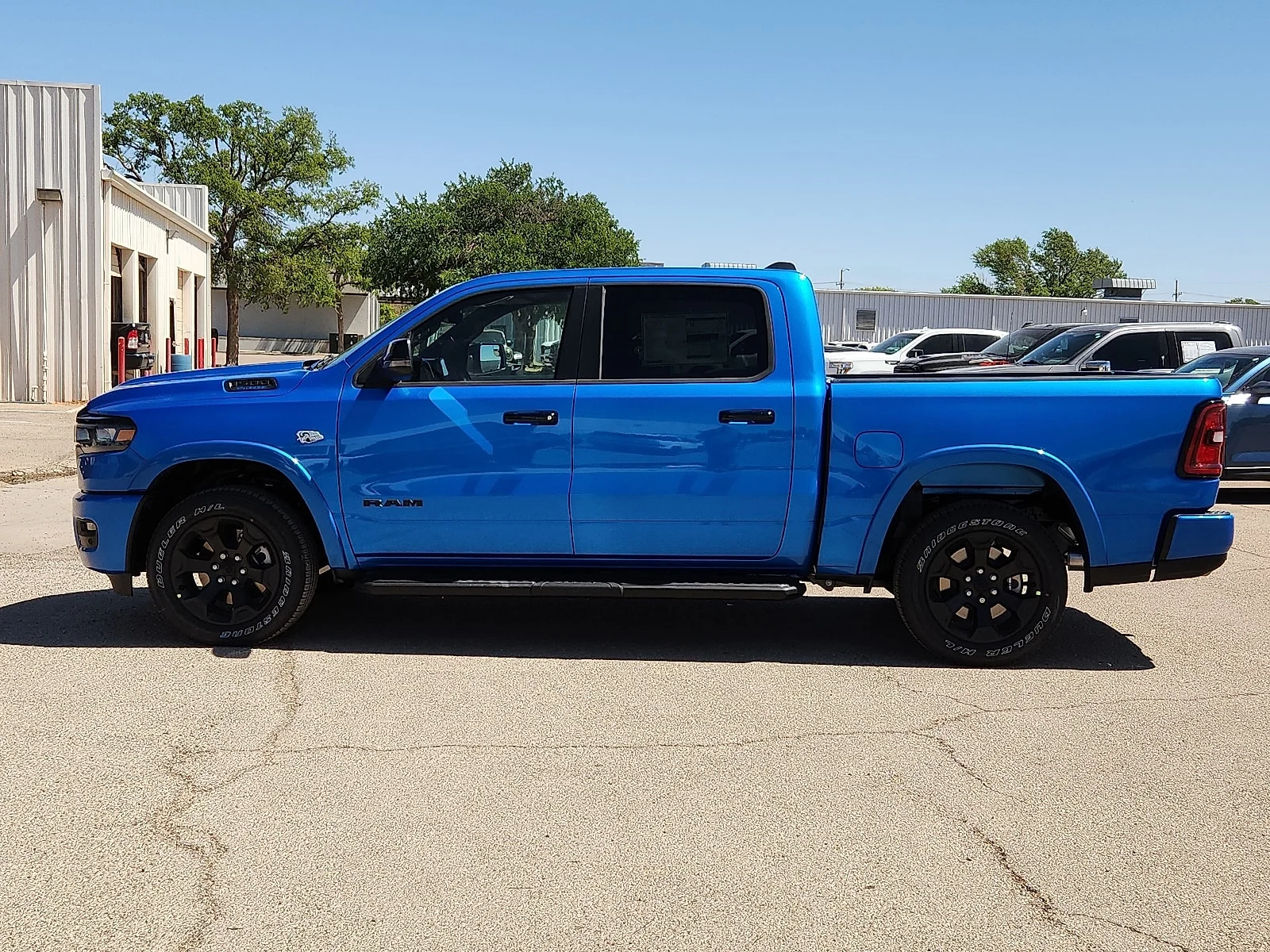 New 2026 Hydro Blue Pearl-Coat  Paint Ram LONE STAR CREW CAB 4X4 5