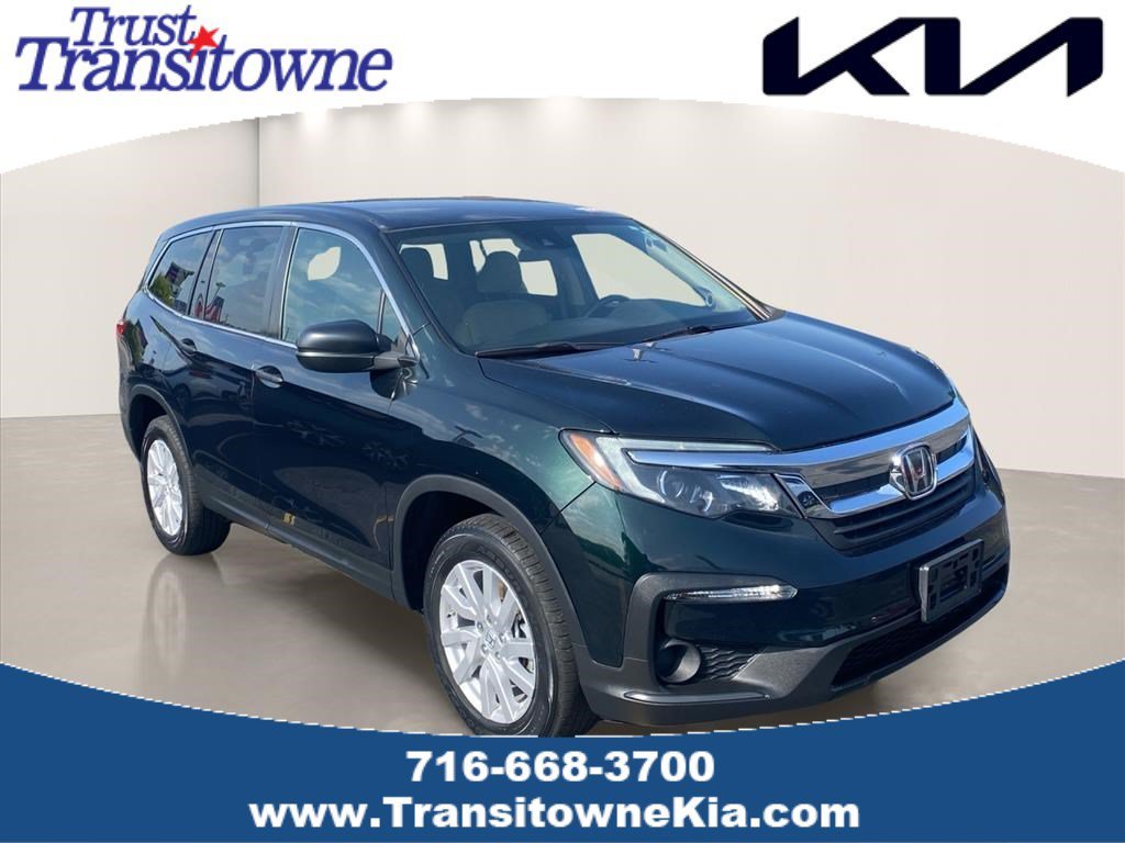 Used 2019 Black Forest Pearl Honda LX image 1