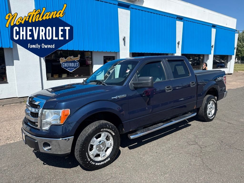 Used 2013 Blue Ford XLT image 1