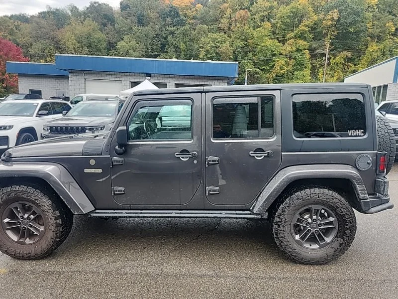 Used 2018 Gray Jeep Unlimited Sport image 4
