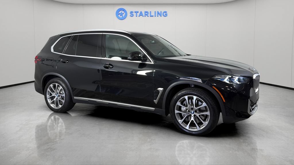 Used 2025 Black BMW xDrive50e image 12