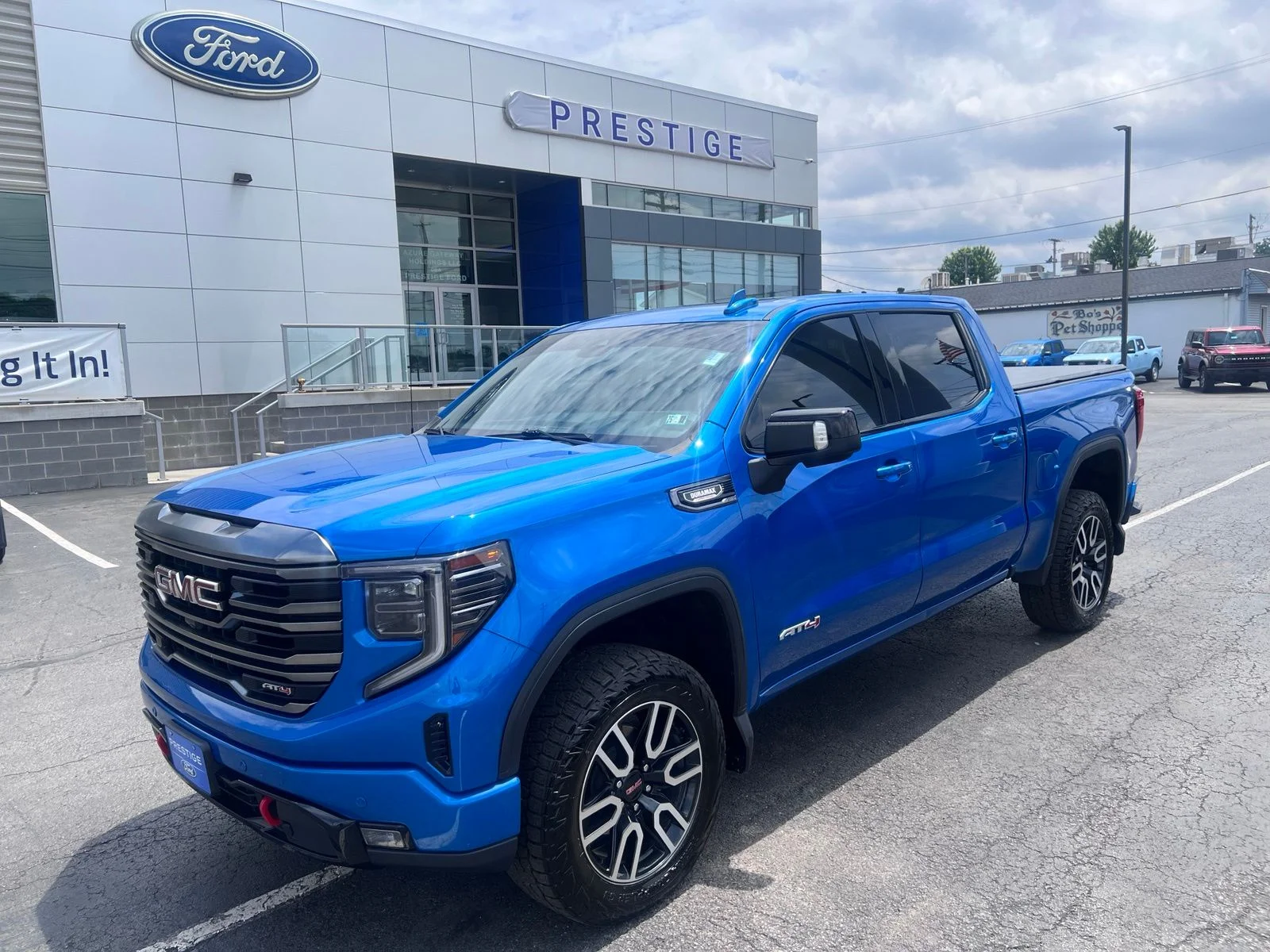 Used 2024 Blue Metallic GMC AT4 image 3