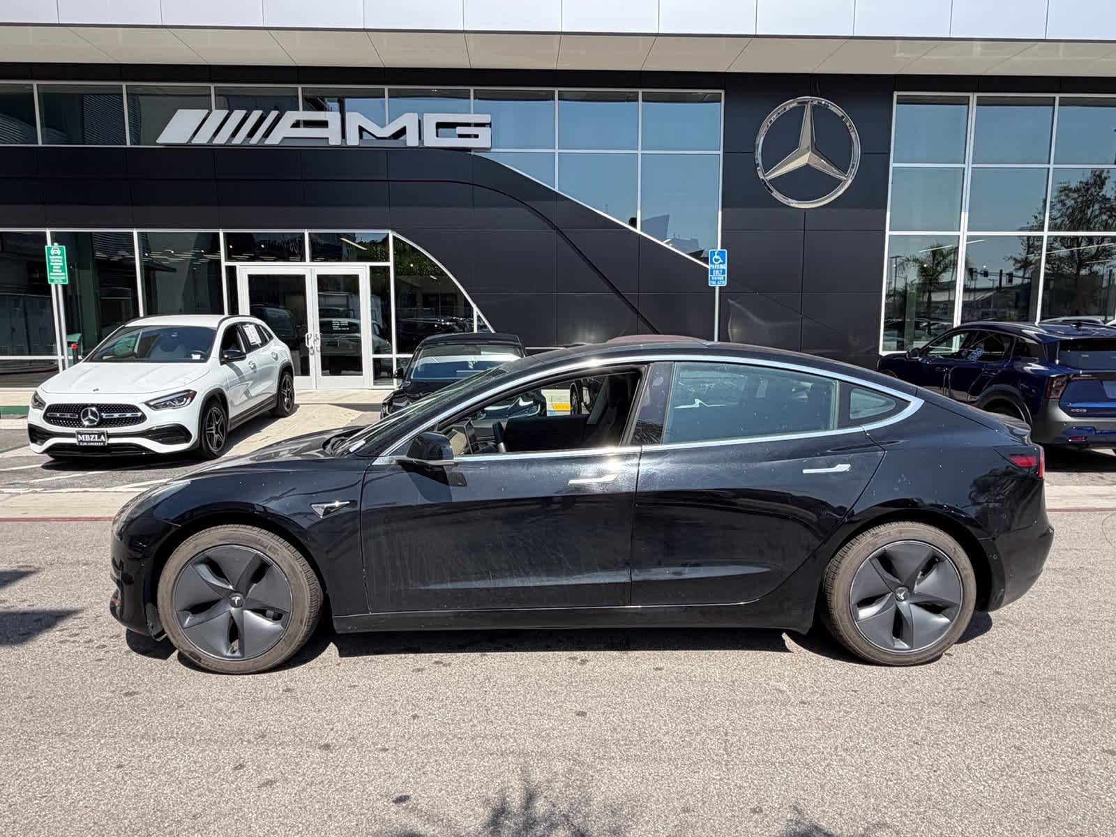 Used 2019 Solid Black Tesla Long Range image 2