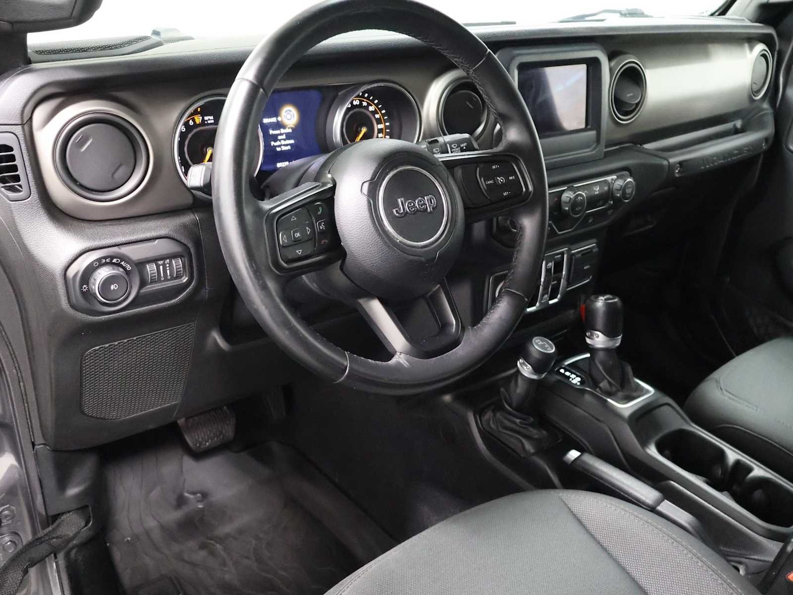 Used 2018 Granite Crystal Metallic Clearcoat Jeep Sport S image 4