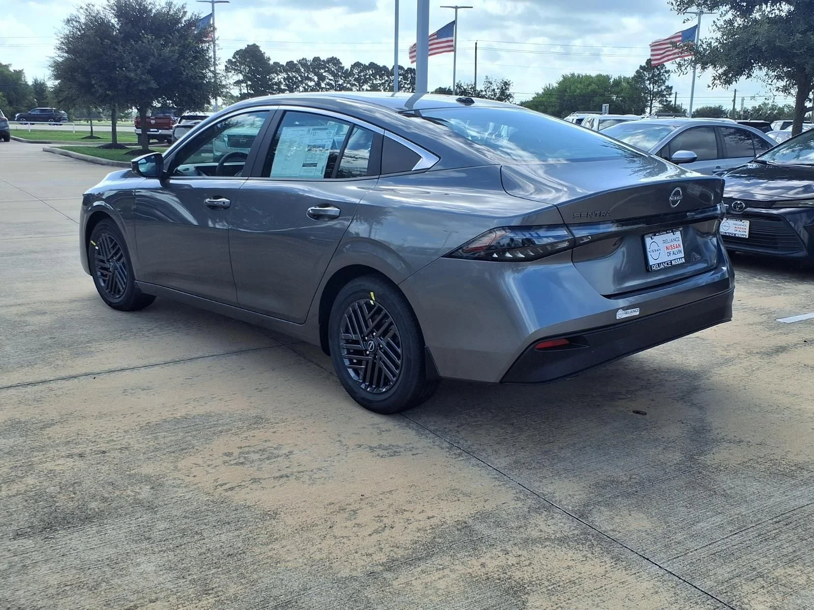 New 2026 Gun Metallic Nissan SV image 2