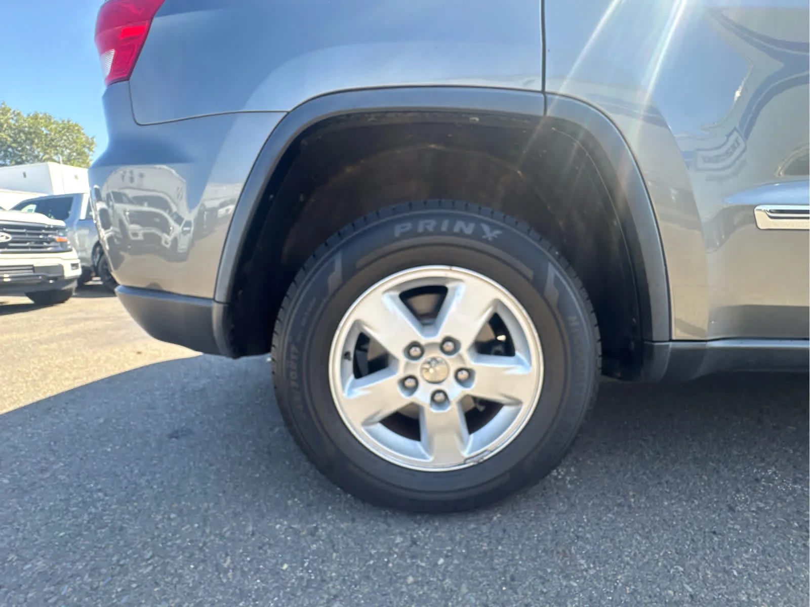 Used 2012 Mineral Gray Metallic Jeep Laredo image 25