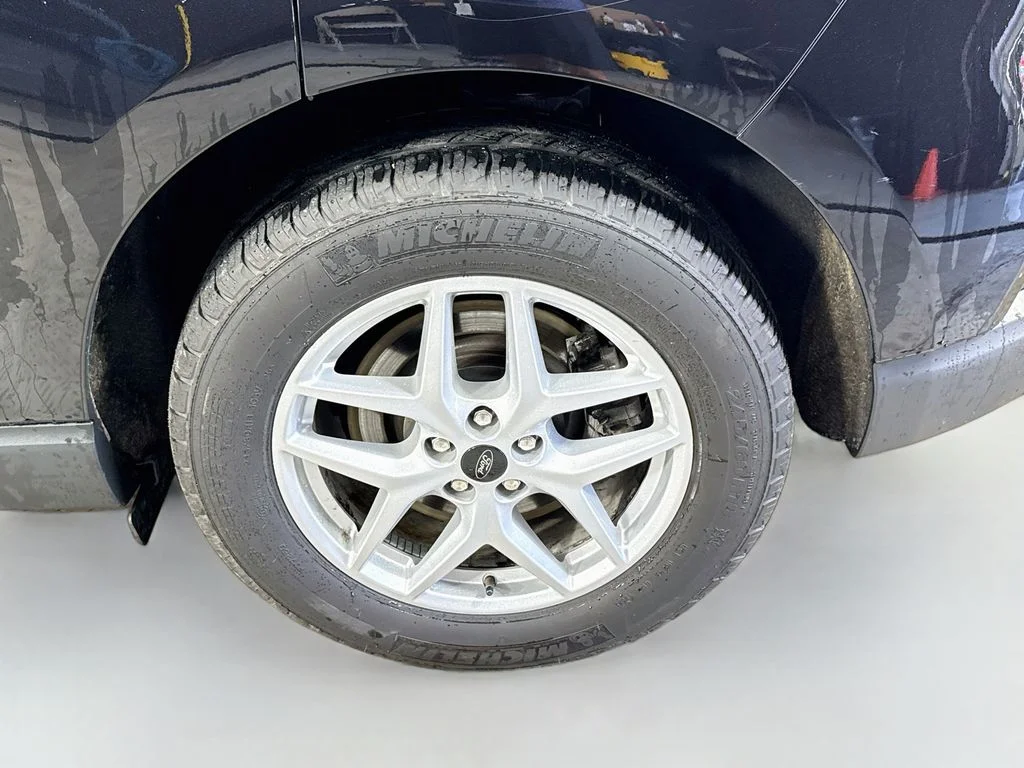 Used 2023 Agate Black Metallic Ford SEL image 31