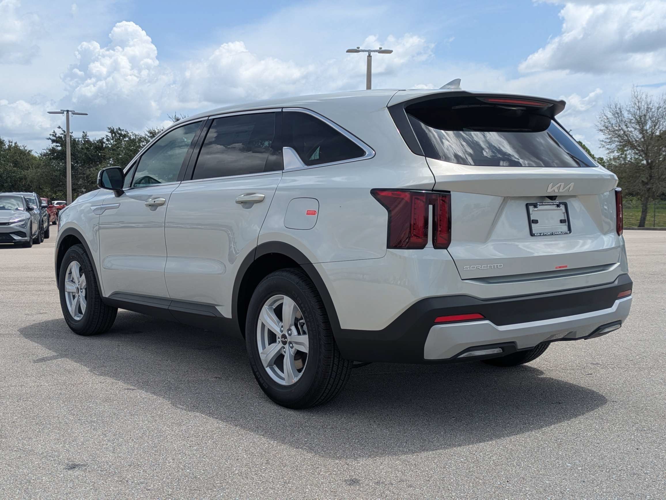 New 2026 Ivory Silver Kia LX image 7