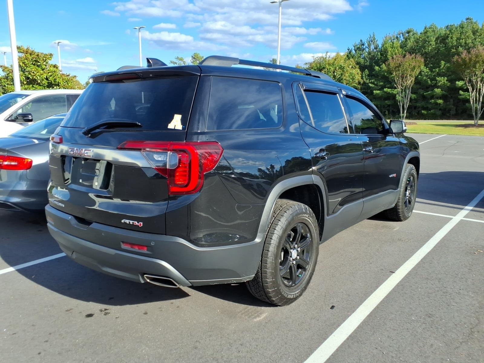 Used 2023 Ebony Twilight Metallic GMC AT4 image 3