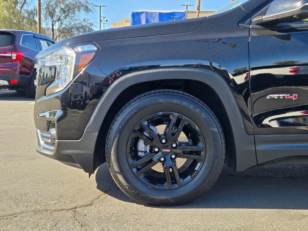 Used 2023 Ebony Twilight Metallic GMC AT4 image 9