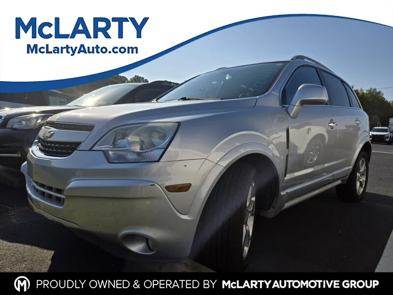 Used 2014 Silver Ice Metallic CHEVROLET LTZ image 1