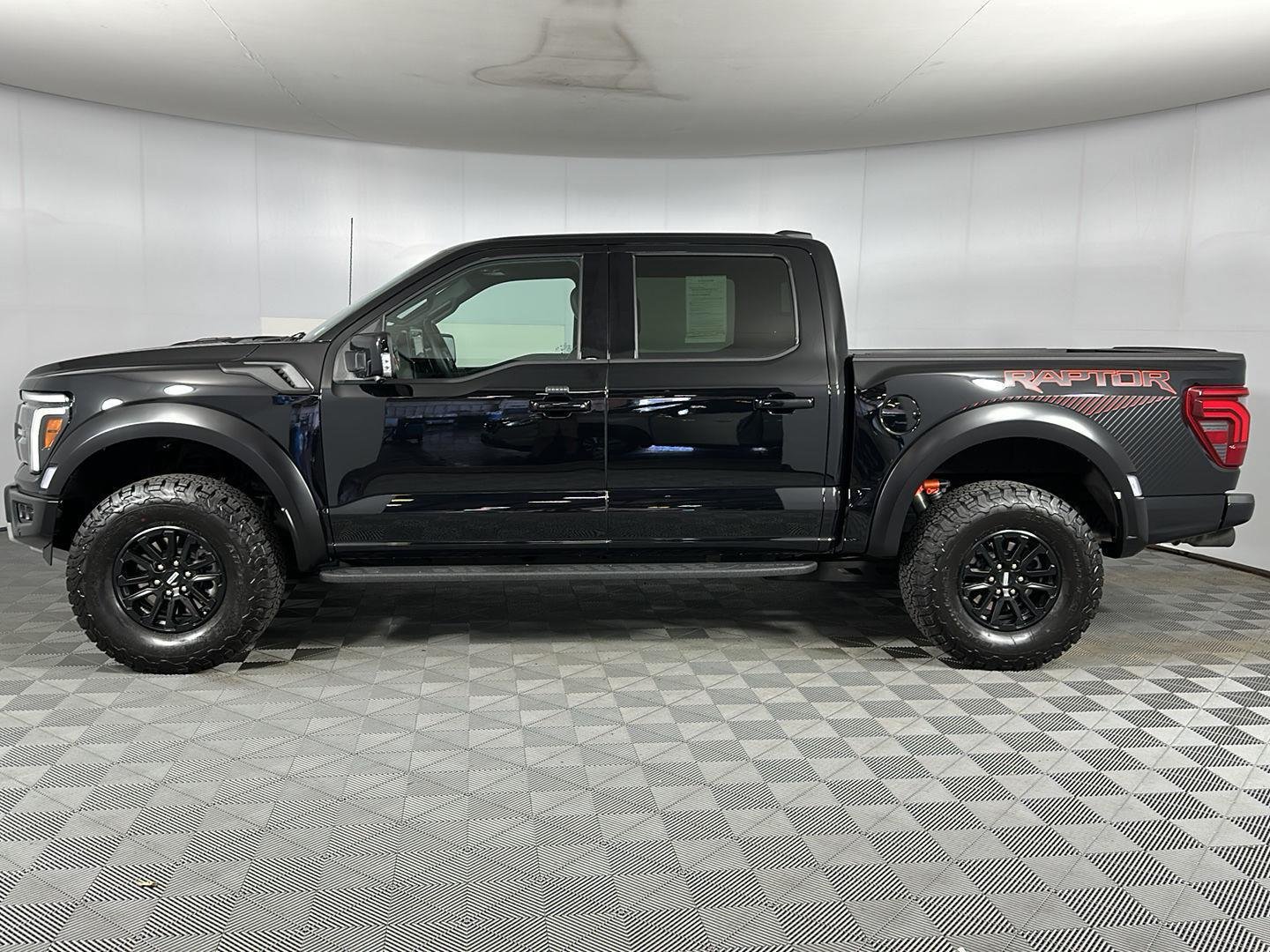 Used 2025 Agate Black Metallic Ford Raptor image 12
