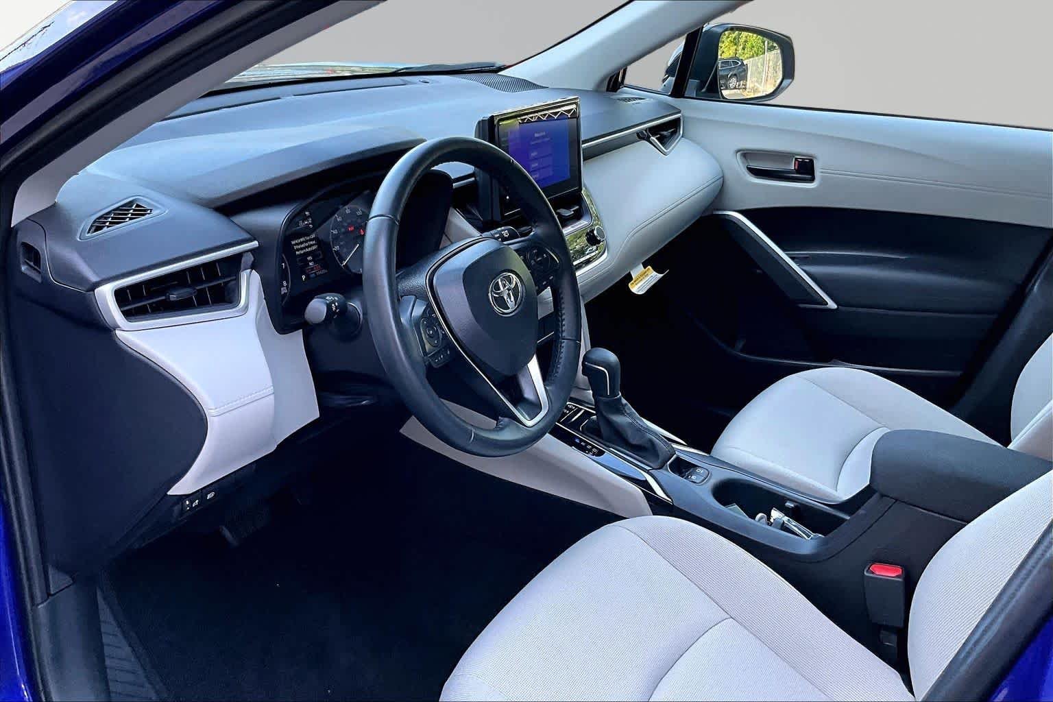 Used 2025 Blue Crush Metallic Toyota LE image 18