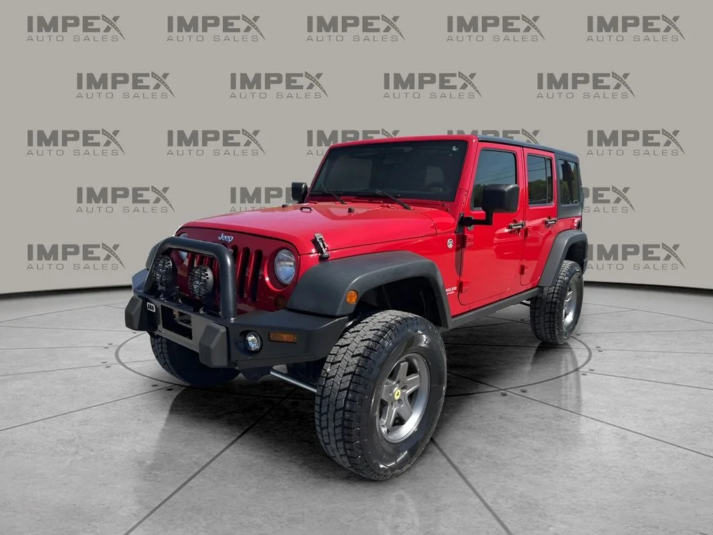 Used 2012 Red Jeep Unlimited Rubicon image 1